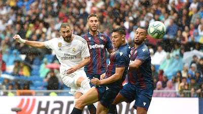 Real Madrid striker Karim Benzema shoots on goal during the La Liga match against Levante at Santiago Bernabeu. Benzema scored twice in a 3-2 win for Real Madrid. Getty Images
