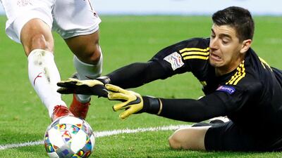 Belgium goalkeeper Thibaut Courtois makes a save. Reuters