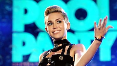 Miley Cyrus's new LP mixes country, pop and attitude. Jeff Daly / Invision / AP