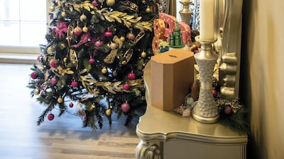 Fuchsia and gold, the couple's wedding colours, inform a tree in the master bedroom