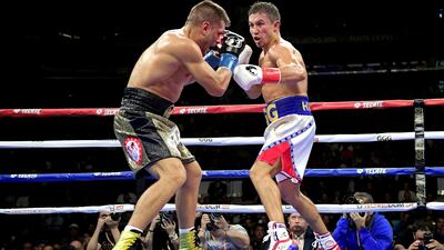 Gennady Golovkin exchanges punches with Sergiy Derevyanchenko during their IBF middleweight title bout at Madison Square Garden. AFP