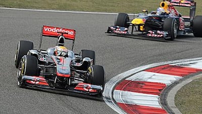 Lewis Hamilton, above left, gave himself strong hopes of winning a second world championship with the way in which he chased down and overtook Sebastian Vettel’s Red Bull Racing car to triumph in Sunday’s Chinese Grand Prix.