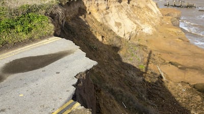 Roads are eroding and dropping off into the North sea at Happisburgh. Global Warming Images/Shutterstock