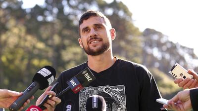 TJ Perenara speaks to media during a Hurricanes Super Rugby training session at Rugby League Park in Wellington, New Zealand. Getty Images