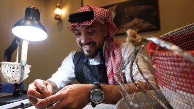 Ahmed from the Visit Bahrain pavilion opens oysters to find pearls, at the Arabian Travel Market. The show runs until May 1, 2025.