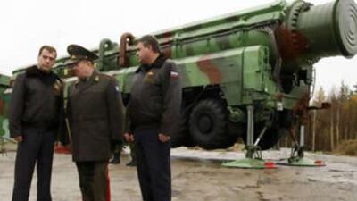 Dmitri Medvedev, Russia's president, left, with Col Gen Nikolai Solovtsov, the commander of Russia's Strategic Missile Forces, centre, and Anatoly Serdyukov, the defence minister, at the Plesetsk cosmodrome.