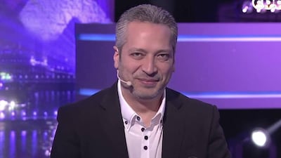 Tamer Amin pictured presenting a talk show in Egypt. File photo / The National