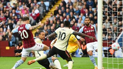 Liverpool's Joel Matip levels the scores at 1-1. Getty