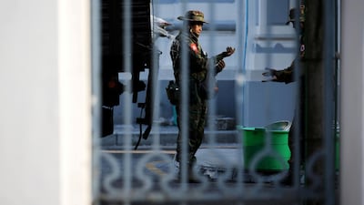 Myanmar soldiers are seen inside City Hall in Yangon, Myanmar. Reuters