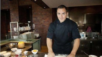 Chef Josh Kucharick rolls out the dough for his bannocks stuffed with spiced pumpkin at Fire and Ice restaurant in Raffles Hotel, Dubai. Photos by Jaime Puebla / The National