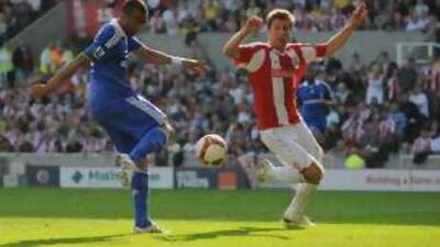Stoke's Richard Cresswell tries in vain to stop Chelsea's Jose Bosingwa scoring the opener.