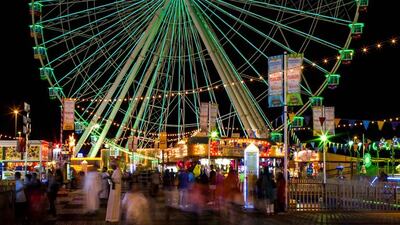Global Village lights up in green in celebration of Ireland’s National Day. Courtesy Tourism Ireland