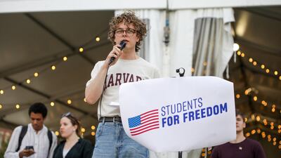 A student protester at Harvard University. The institution has warned that revoking its tax-exempt status could put research programmes at risk. Reuters