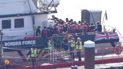 A UK Border Force vessel brings a group of people to the English coast on Monday, two days after six people died in a small boat crossing. PA