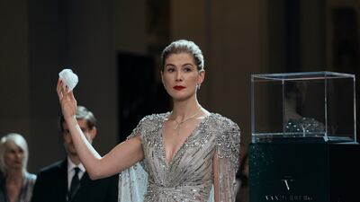 This image released by Lionsgate shows Rosamund Pike in a scene from "Now You See Me: Now You Don't. " (Katalin Vermes / Lionsgate via AP)