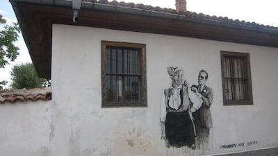 The black-on-white murals, painted with the help of about 20 students, depict other political leaders as well. Courtesy Bojana Stoianova