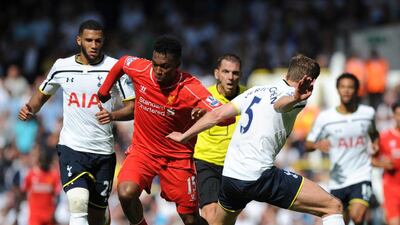 Liverpool's Daniel Sturridge dribbles past Tottenham Hotspur's Jan Vertonghen during their Premier League match on Sunday at White Hart Lane. Olly Greenwood / AFP
