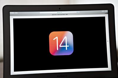 The iOS 14 badge is displayed on a laptop during the Apple conference on Monday. Bloomberg