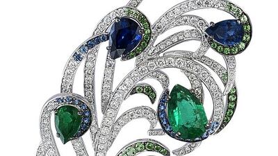 Elegant Feathers brooch in sapphire, emerald, savorite and white diamond from the Journey To Dreams Collection.