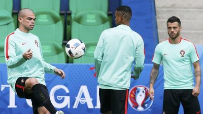 Portugal’s Pepe (L) and teammates shown during training ahead of their Euro 2016 Group F match against Iceland. Robert Pratta / Reuters