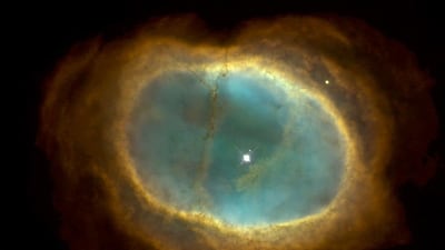 The Southern Ring Nebula is nearly half-a-light-year in diameter and 2,000 light years from Earth. Photo: AFP / Nasa / The Hubble Heritage Team