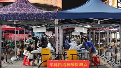 People queue for Covid-19 tests in Guangzhou, in the southern Chinese province of Guangdong. Reuters