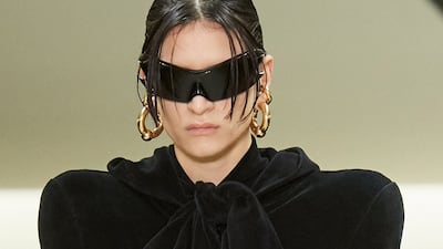 A velvet tracksuit with padded shoulders