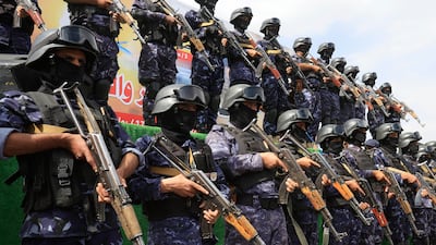 Houthi troops stand guard during a protest against Saudi Arabia in Sanaa, Yemen. EPA