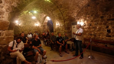 Foreign tourist listen about the history of Hanania church during a visit to the old city of Damascus, Syria. EPA
