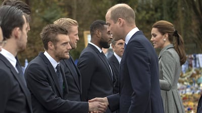 Prince William and Kate, Duchess of Cambridge, meet with Leicester City players, including Jamie Vardy and Kasper Schmeichel, on Wednesday. Getty