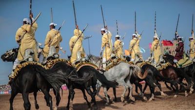 A troupe charges holding their rifles before firing, during Tabourida, a traditional horse riding show also known as Fantasia, in the coastal town of El Jadida, Morocco. All photos: AP / Mosa'ab Elshamy