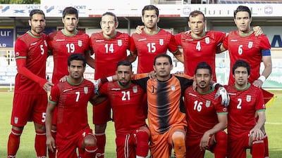 Iranian national soccer team players (front row, left to right) Masoud Shojaei, Ashkan Dejagah, goalkeeper Rahman Ahmadi, Reza Ghoochannejhad and Khosro Heydari; (back row, left to right) Amir Hossein Sadeghi, Hashem Beikzadeh, Andranik Teymourian, Pejman Montazeri, Jalal Hosseini and captain Javad Nekounam. Erwin Scheriau / EPA
