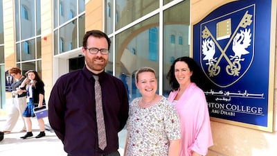 Andrew McLoughlin, English teacher, Ruth Forsythe, director of music and Louise Brashier, geography teacher, at Brighton College in Abu Dhabi. Ravindranath K / The National