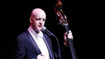 Jim Tavaré performs his comedy act, which features his double bass, dressed in a tuxedo and tails. Courtesy Jim Tavaré
