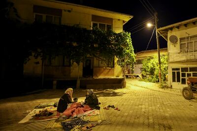 Some Sindirgi residents rested outdoors after the earthquake. AP