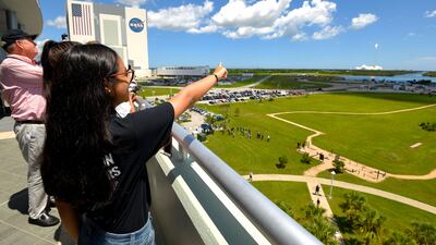 Emirati student Alia Al Mansoori, watches a SpaceX Falcon 9 rocket launch from Kennedy Space Center carrying her Genes in Space experiment to the International Space Station. Scott A. Miller / The National