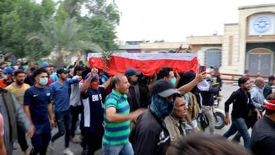 epa08030563 Iraqis carry the coffin of a protester who was reportedly killed during clashes with security forces at Nasiriyah city, some 370km southeast of Baghdad, Iraq, 28 November 2019. Security forces have reportedly fired live rounds and tear gas at anti-government protesters in Nasiriyah killing at least 18 protesters and wounded some 120 others, according to medical officials. EPA/HAIDER AL-ASSADEE -- BEST QUALITY AVAILABLE