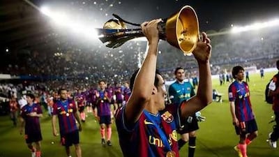 Barcelona parades their first-place trophy in the final match of the FIFA Club World Cup at Zayed Sports City last year.