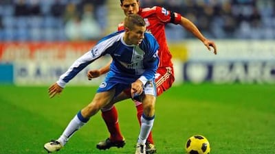 Tom Cleverley, front, has been loaned to Wigan Athletic by Manchester United, but is expected to be recalled by Sir Alex Ferguson in January.
