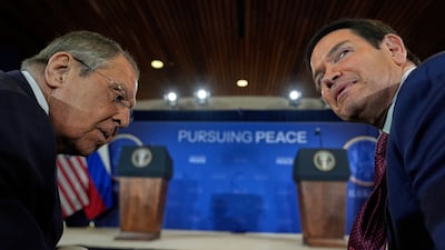 Russian Foreign Minister Sergey Lavrov and US Secretary of State Marco Rubio talk before a news conference in Alaska on Friday. AP