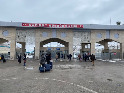 Iranians crossing in and out of Turkey at the Kapikoy border crossing with Iran. Lizzie Porter / The National