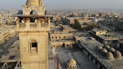 A drone picture shows empty streets and damaged buildings in the town of Maaret Al-Numan in the northwestern Idlib province. AFP