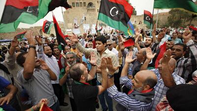 Libyans celebrate at Martyrs' Square in Tripoli after the supreme court invalidated the country's parliament. Ismail Zitouny/Reuters