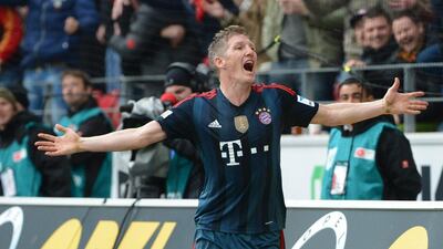 Bastian Schweinsteiger celebrates his goal against Mainz on Saturday. Arne Dedert / EPA / March 22, 2014