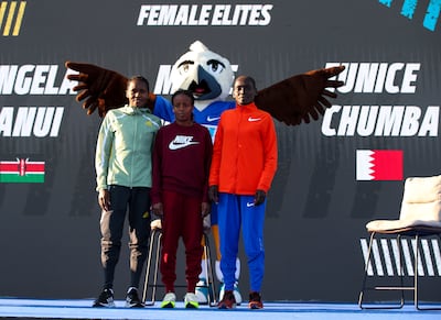 Left to right: Angela Tanui, Mare Dibaba and Eunice Chumba ahead of the Abu Dhabi Marathon. Victor Besa / The National