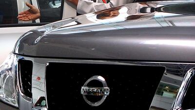 A customer is briefed on the features of a Nissan Patrol. Satish Kumar / The National