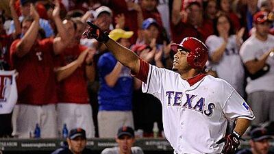 Nelson Cruz celebrates as he jogs a round the bases in the seventh inning as Texas Rangers beat Detroit Tigers 15-5 to book their place in the World Series.