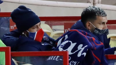 Neymar and Leandro Paredes are seen on the bench during the match. Reuters