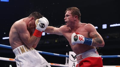 DCanelo Alvarez (red) and Callum Smith during their WBA, WBC and Ring Magazine super middleweight championship bout at the Alamodome in San Antonio. USA Today