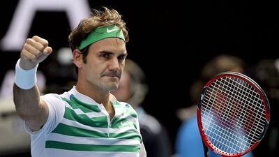 Roger Federer of Switzerland celebrates after defeating Tomas Berdych of the Czech Republic in their quarterfinal match at the Australian Open tennis championships in Melbourne, Australia, Tuesday, Jan. 26, 2016.(AP Photo/Aaron Favila)